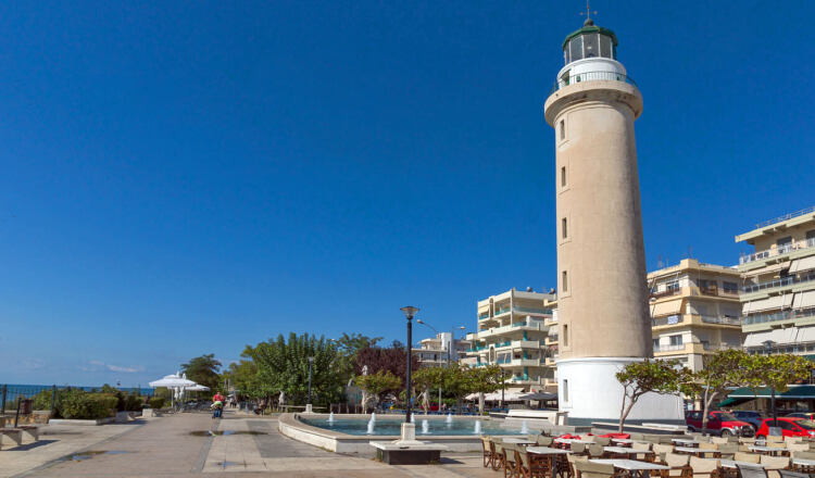 View of the town, with the impressive lighthouse dominating at the port area