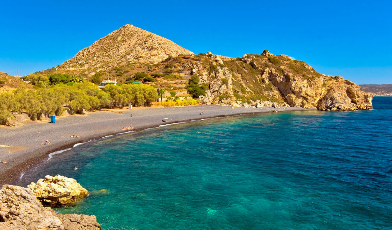 Mavra Volia beach with people hanging around