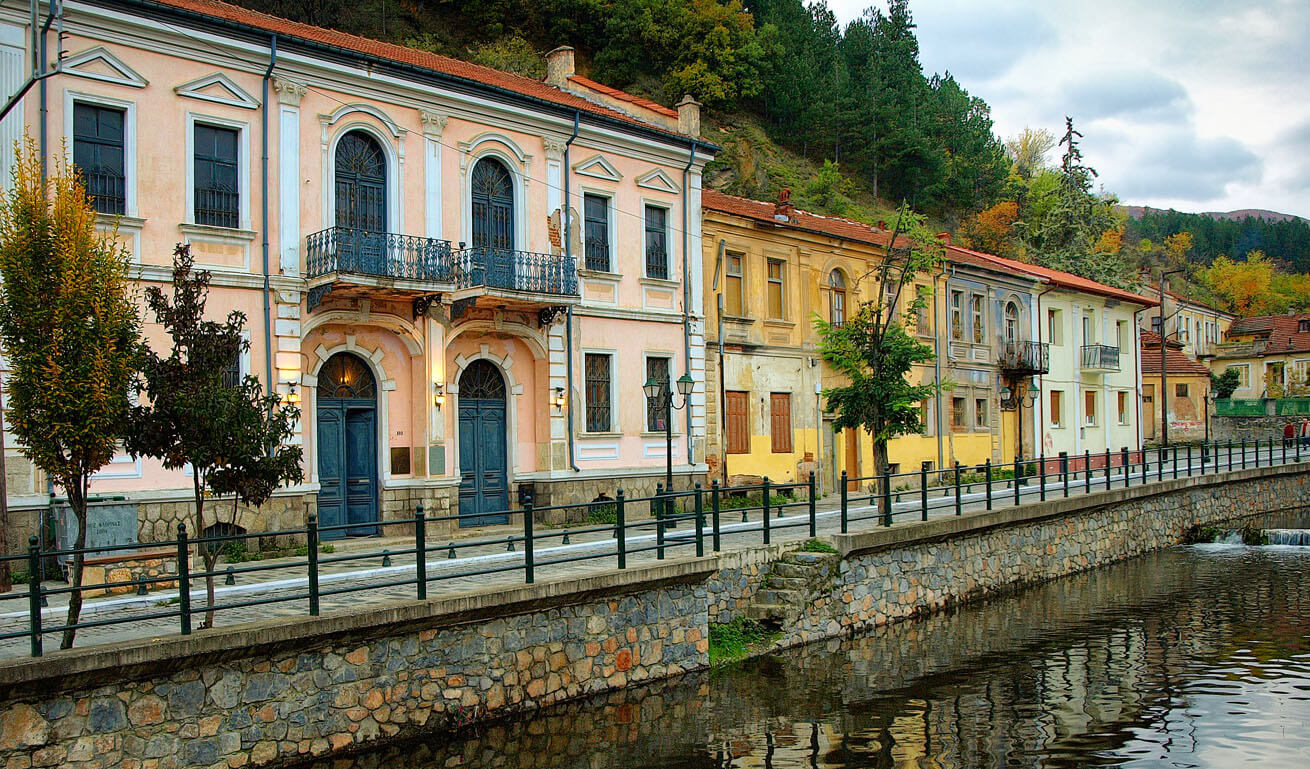 Traditional houses of the town along the side of the lake