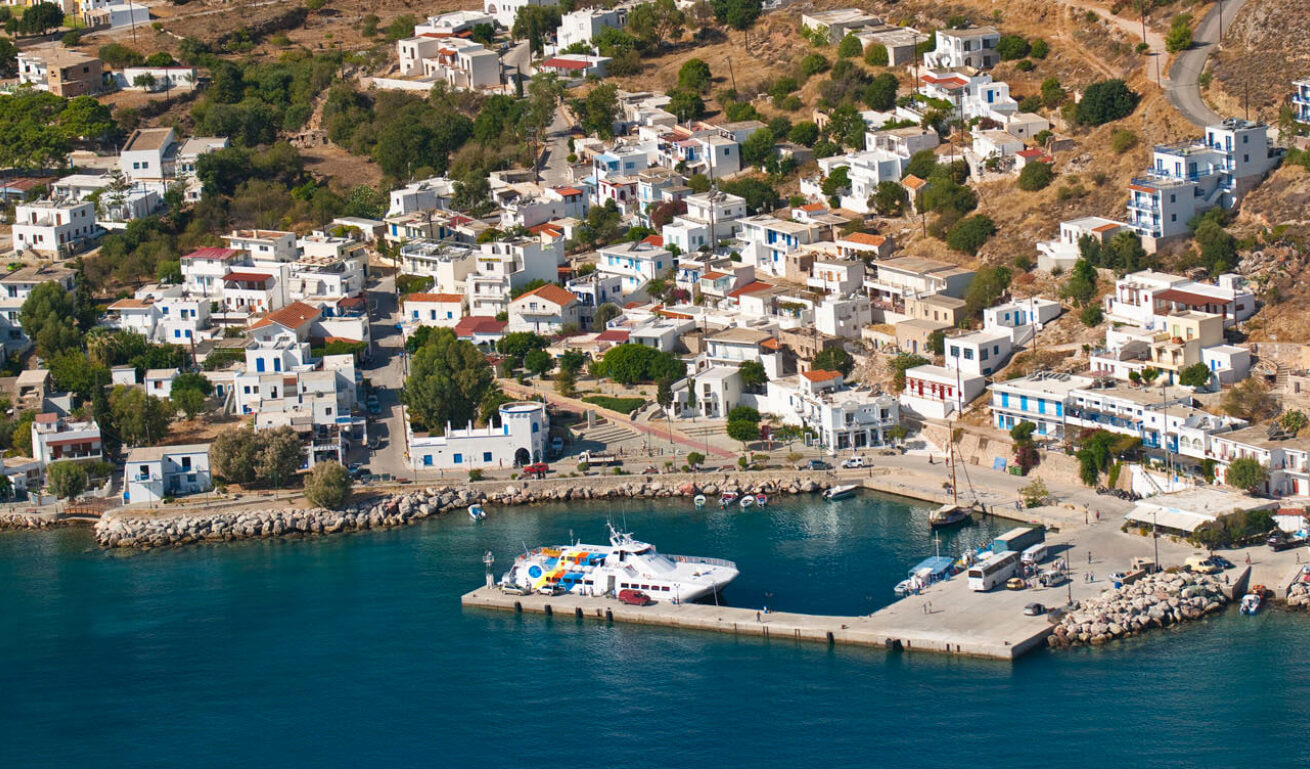 Panoramic view of the port and the island with the traditional houses