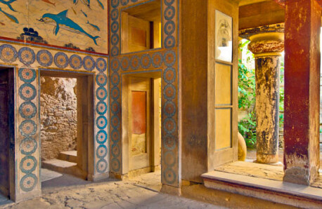 Interior of an ancient building with openings and frescoes on the walls
