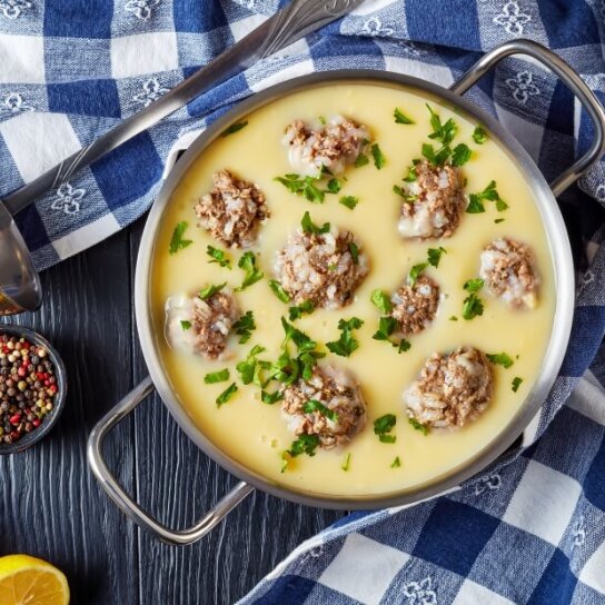 A dish with greek meatball soup called giouvarlakia