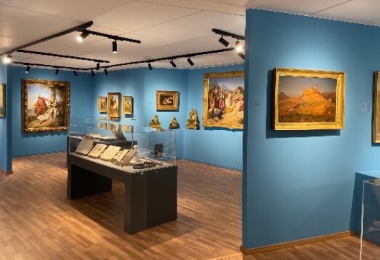 Various objects and paintings are exhibited in the museum