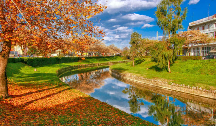 View of the river of the town, with trees between its banks