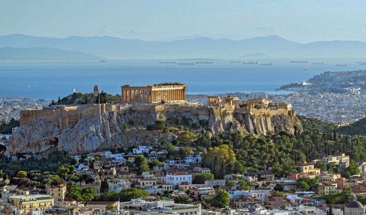 View of Athens with picturesque houses and in the background Acropolis is seen 