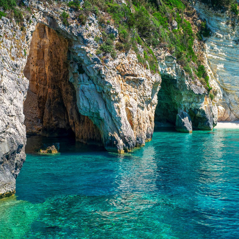 View of the blue caves with greenish blue waters