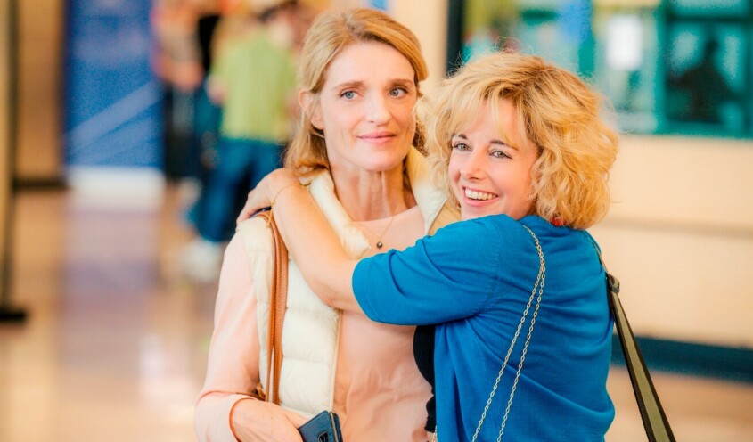 Two women hugging